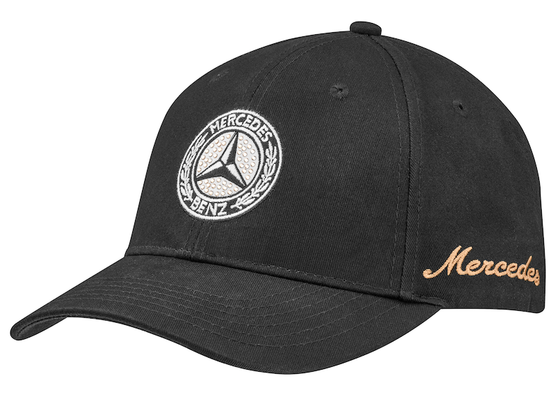Cap. Black. 100% cotton. Embroidered vintage star on the front, with crystals. Embroidered vintage "Mercedes" lettering on left side in gold. Metal clasp for adjusting fit.