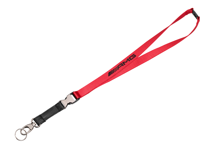 AMG lanyard. Red/black. Nylon/metal/plastic. Carbon-fibre-look front part. Click-lock fastener. Snap hook and split ring. Safety clasp. Length approx. 53 cm, width approx. 2 cm.