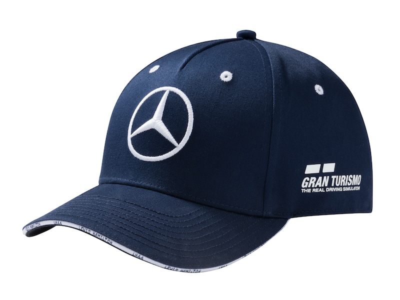 Cap, Hamilton, Great Britain Special Edition. Navy blue. Outer material 100% cotton, inner lining 100% polyester. Underside of peak in black. Monster Energy® logo on the underside of the brim. White embroidered Mercedes star logo on the front. GRAN TURISMO logo on the side. Velcro fastening allows size to be adjusted.